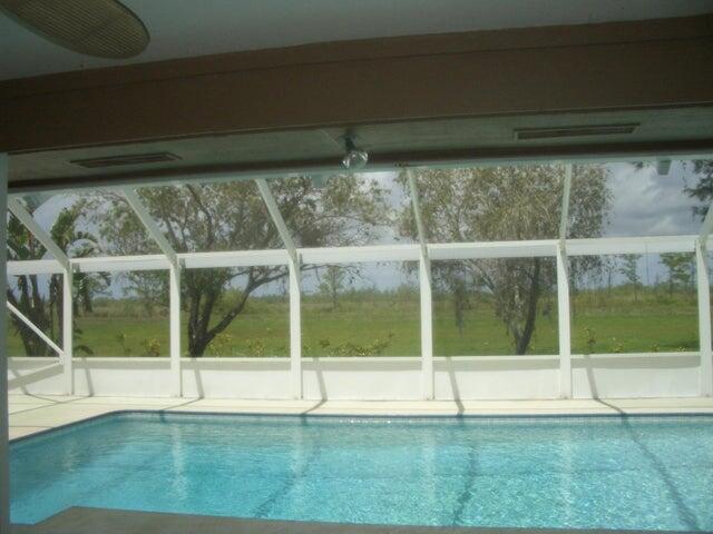 24 Dunbar Rd, Palm Beach Gardens, FL 33418 - view of outdoor pool