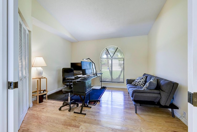 2282 NE Marlberry Ln, Jensen Beach, FL 34957 - office featuring wood finished floors and vaulted ceiling