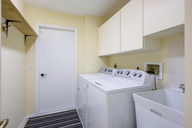 2282 NE Marlberry Ln, Jensen Beach, FL 34957 - laundry room with cabinet space, separate washer and dryer, and carpet floors