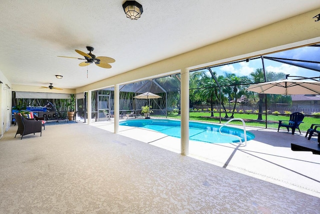 2282 NE Marlberry Ln, Jensen Beach, FL 34957 - view of pool with a patio area, a ceiling fan, and a lanai