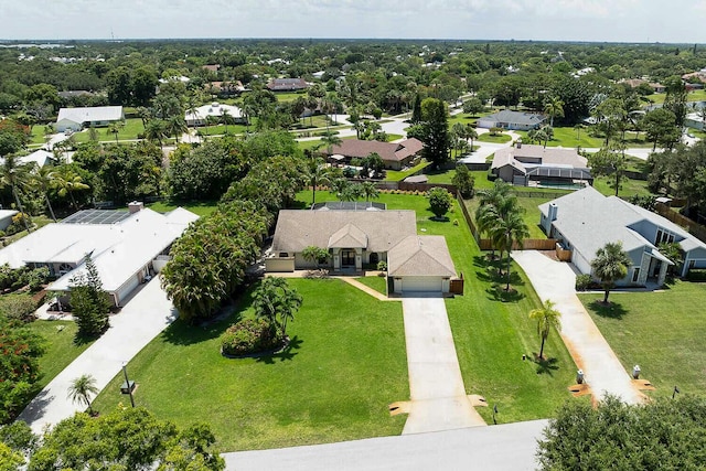 2282 NE Marlberry Ln, Jensen Beach, FL 34957 - aerial perspective of suburban area