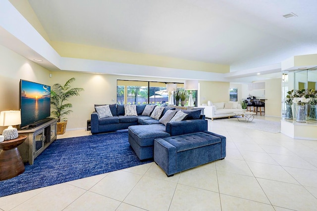2282 NE Marlberry Ln, Jensen Beach, FL 34957 - living room with tile patterned flooring and lofted ceiling