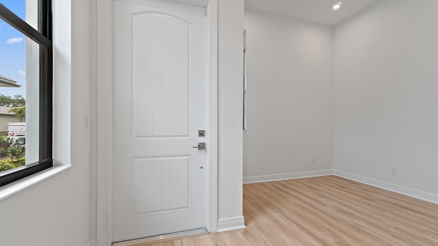 203 SE Via Sangro, Port Saint Lucie, FL 34952 - entrance foyer featuring light wood-style flooring and recessed lighting