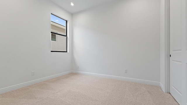 203 SE Via Sangro, Port Saint Lucie, FL 34952 - empty room featuring carpet and recessed lighting