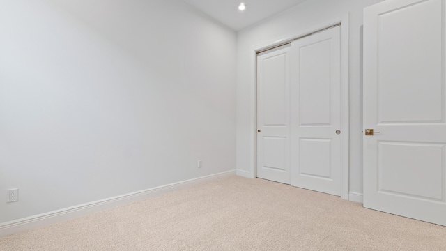 203 SE Via Sangro, Port Saint Lucie, FL 34952 - unfurnished bedroom with light colored carpet and a closet