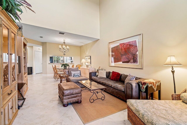 767 Windermere Way Unit 767, Palm Beach Gardens, FL 33418 - living room with a chandelier and a high ceiling