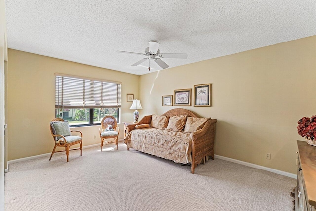 767 Windermere Way Unit 767, Palm Beach Gardens, FL 33418 - bedroom featuring light carpet, a textured ceiling, and a ceiling fan