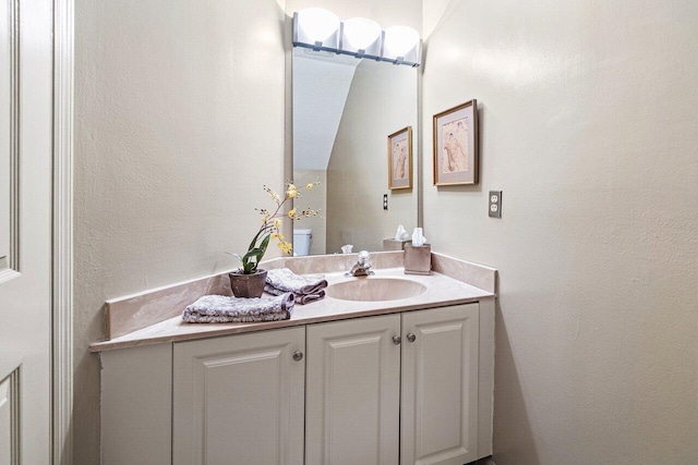 767 Windermere Way Unit 767, Palm Beach Gardens, FL 33418 - bathroom with vanity and a textured wall