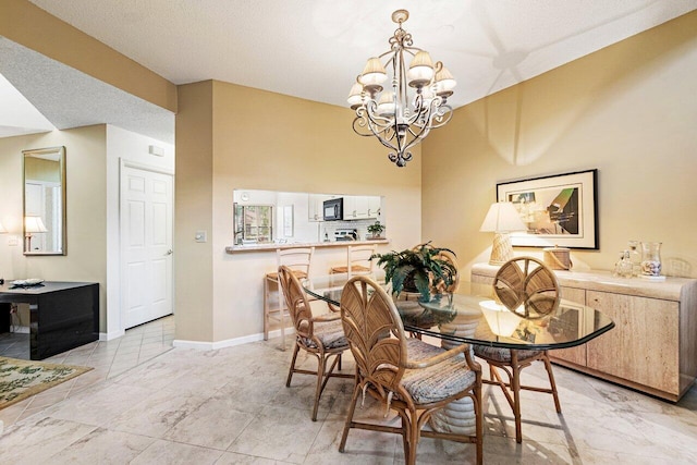 767 Windermere Way Unit 767, Palm Beach Gardens, FL 33418 - dining room featuring a chandelier and baseboards