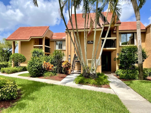 11186 Green Lake Dr Unit 202, Boynton Beach, FL 33437 - view of property with stairs