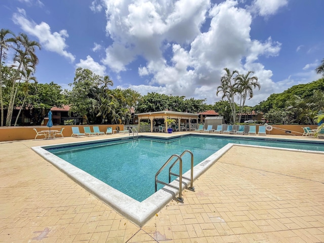 11186 Green Lake Dr Unit 202, Boynton Beach, FL 33437 - community pool with a patio