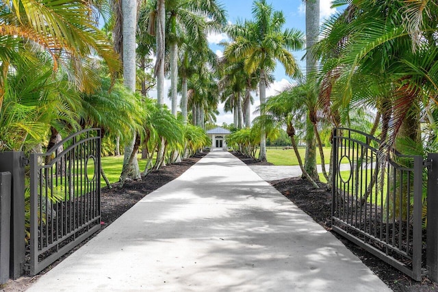 11533 Manatee Ter Unit 11533, Lake Worth, FL 33449 - surrounding community with a gate and a water view