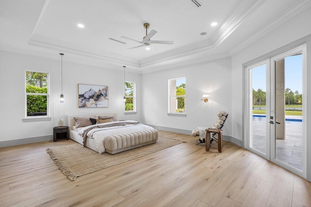 11533 Manatee Ter Unit 11533, Lake Worth, FL 33449 - bedroom featuring a raised ceiling, access to exterior, light wood finished floors, ornamental molding, and recessed lighting