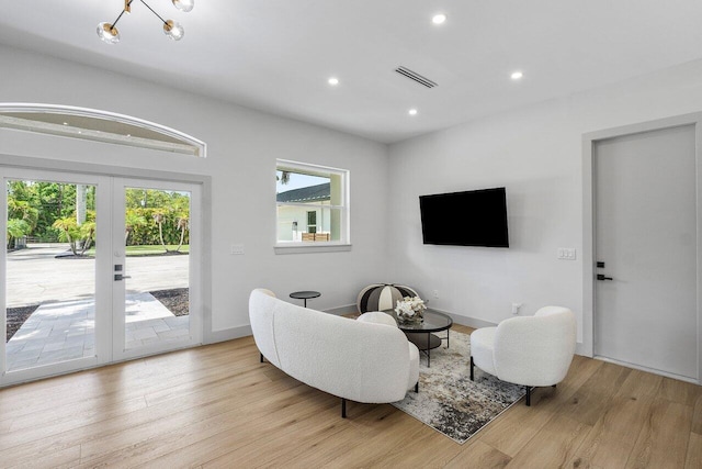 11533 Manatee Ter Unit 11533, Lake Worth, FL 33449 - living room featuring wood finished floors, recessed lighting, and french doors