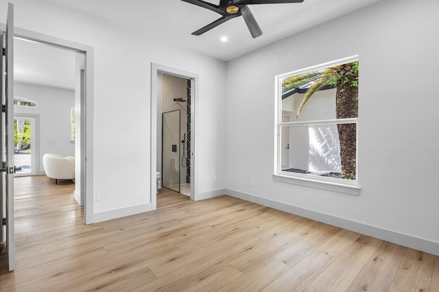 11533 Manatee Ter Unit 11533, Lake Worth, FL 33449 - empty room featuring light wood finished floors, ceiling fan, and recessed lighting