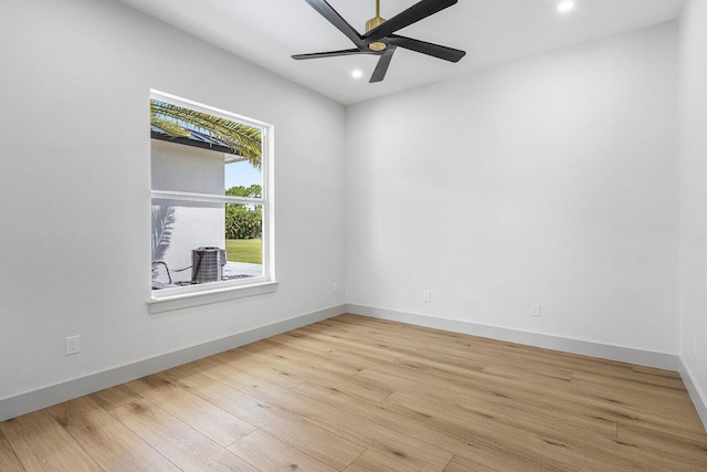 11533 Manatee Ter Unit 11533, Lake Worth, FL 33449 - empty room featuring recessed lighting, wood finished floors, and ceiling fan