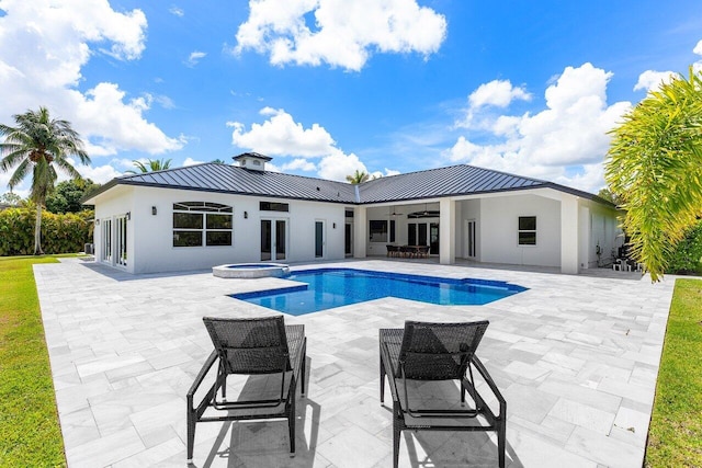 11533 Manatee Ter Unit 11533, Lake Worth, FL 33449 - view of pool featuring a ceiling fan, a patio area, and a pool with connected hot tub