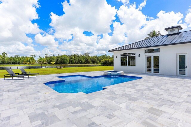 11533 Manatee Ter Unit 11533, Lake Worth, FL 33449 - view of pool featuring french doors, a patio area, and a pool with connected hot tub