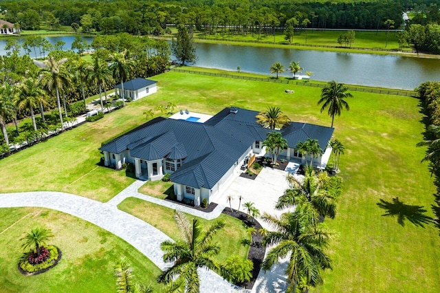 11533 Manatee Ter Unit 11533, Lake Worth, FL 33449 - view of subject property featuring a nearby body of water and a heavily wooded area