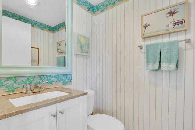 18429 SE Wood Haven Ln Unit G, Jupiter, FL 33469 - bathroom with vanity and wallpapered walls