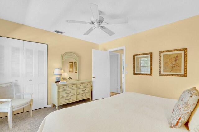 18429 SE Wood Haven Ln Unit G, Jupiter, FL 33469 - carpeted bedroom with a closet and a ceiling fan