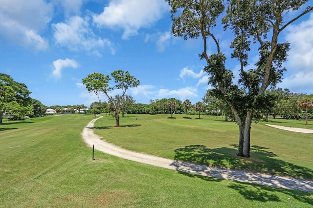 18429 SE Wood Haven Ln Unit G, Jupiter, FL 33469 - surrounding community featuring golf course view, a yard, and view of scattered trees