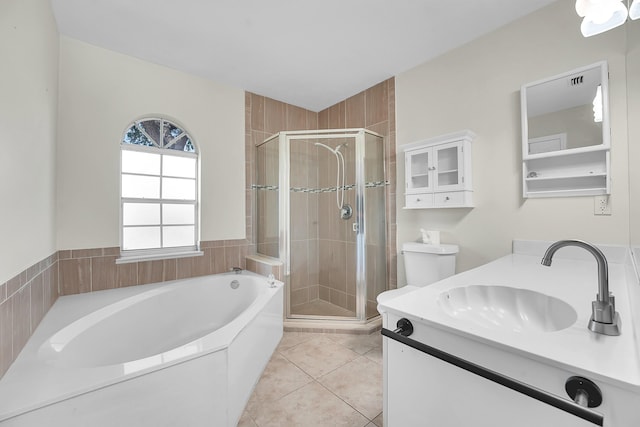 790 SE Ablett Ln, Port Saint Lucie, FL 34984 - bathroom with a garden tub, a stall shower, vanity, and tile patterned floors