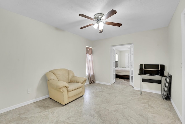 790 SE Ablett Ln, Port Saint Lucie, FL 34984 - living area with ceiling fan and baseboards