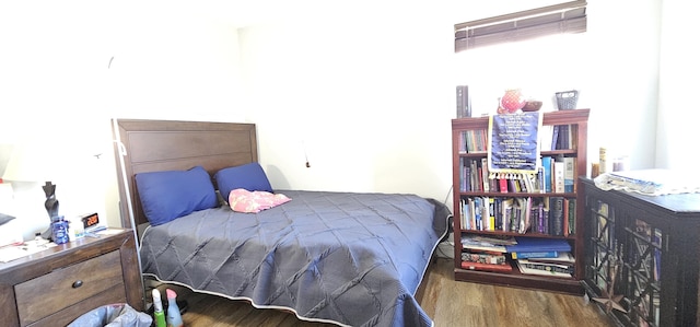 716 NW 16th St, Belle Glade, FL 33430 - bedroom featuring wood finished floors