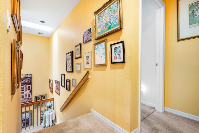 5404 E Pointe Villa Dr Unit 5406, Lighthouse Point, FL 33064 - corridor with carpet flooring and a skylight