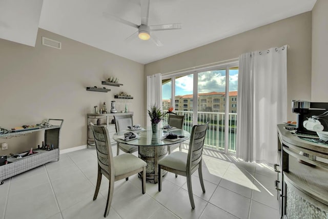 7 Harbour Isle Dr Unit 301, Fort Pierce, FL 34949 - dining space featuring ceiling fan and light tile patterned floors