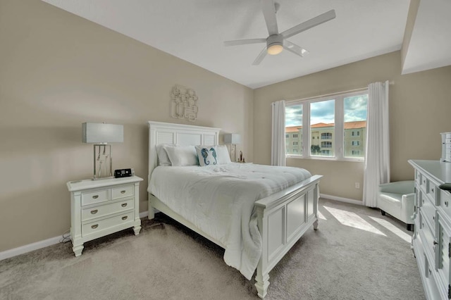 7 Harbour Isle Dr Unit 301, Fort Pierce, FL 34949 - bedroom with light colored carpet and a ceiling fan