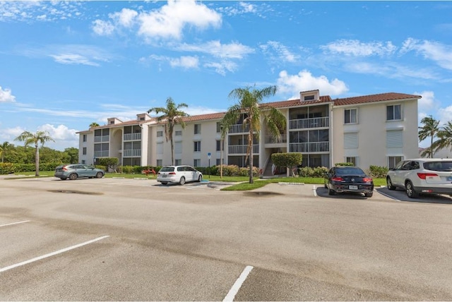 4444 NE Ocean Blvd Unit C2, Jensen Beach, FL 34957 - view of apartment building / complex with uncovered parking