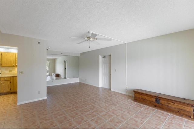 4444 NE Ocean Blvd Unit C2, Jensen Beach, FL 34957 - unfurnished room featuring ceiling fan and a textured ceiling