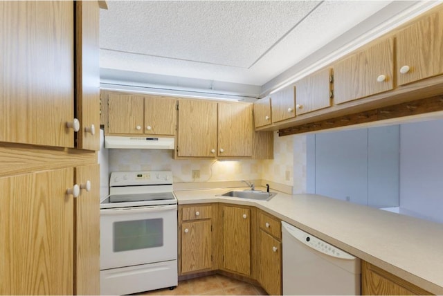 4444 NE Ocean Blvd Unit C2, Jensen Beach, FL 34957 - kitchen with white appliances, under cabinet range hood, light countertops, a textured ceiling, and light tile patterned flooring