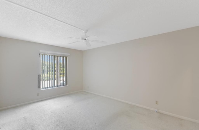 4444 NE Ocean Blvd Unit C2, Jensen Beach, FL 34957 - unfurnished room with ceiling fan and light carpet