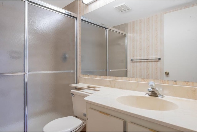 4444 NE Ocean Blvd Unit C2, Jensen Beach, FL 34957 - full bathroom featuring wallpapered walls, vanity, and a shower with door