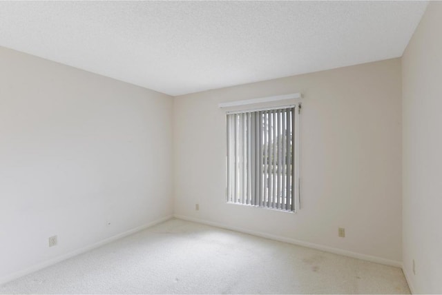 4444 NE Ocean Blvd Unit C2, Jensen Beach, FL 34957 - carpeted spare room with baseboards