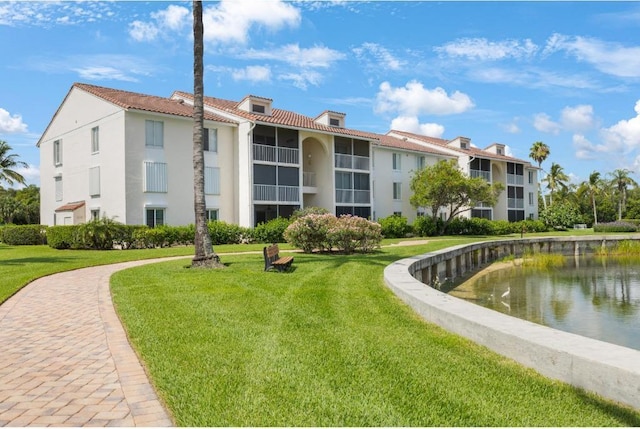 4444 NE Ocean Blvd Unit C2, Jensen Beach, FL 34957 - view of property's community featuring a lawn