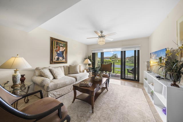 601 Seafarer Cir Unit 104, Jupiter, FL 33477 - living area featuring a ceiling fan and light tile patterned floors