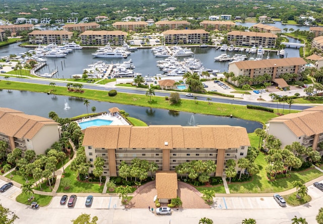 601 Seafarer Cir Unit 104, Jupiter, FL 33477 - bird's eye view of a marina and a nearby body of water