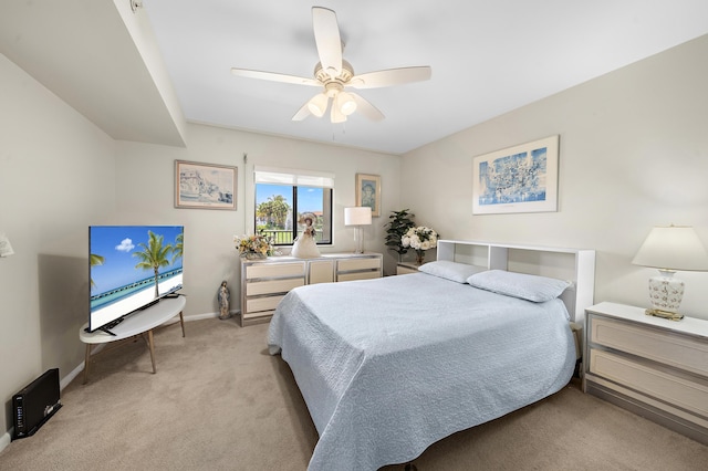601 Seafarer Cir Unit 104, Jupiter, FL 33477 - bedroom with light carpet and ceiling fan