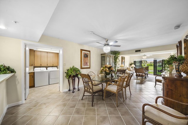 601 Seafarer Cir Unit 104, Jupiter, FL 33477 - dining room featuring ceiling fan, washer and clothes dryer, and light tile patterned floors