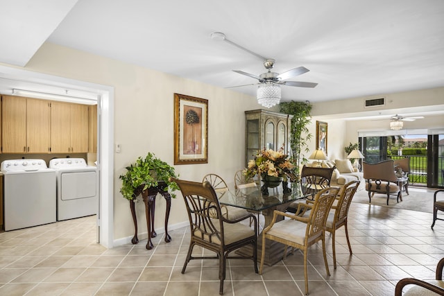 601 Seafarer Cir Unit 104, Jupiter, FL 33477 - dining room with a ceiling fan, washer and clothes dryer, and light tile patterned floors