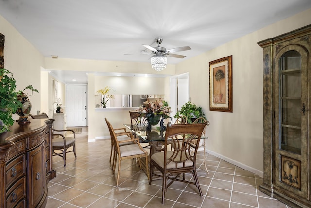 601 Seafarer Cir Unit 104, Jupiter, FL 33477 - dining room featuring ceiling fan and tile patterned floors