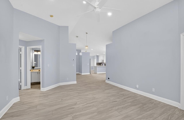 8182 Duomo Cir, Boynton Beach, FL 33472 - unfurnished living room featuring a ceiling fan, light wood-type flooring, recessed lighting, and high vaulted ceiling