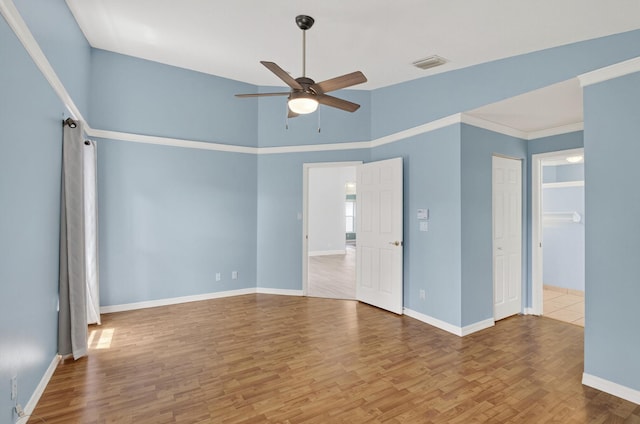 8182 Duomo Cir, Boynton Beach, FL 33472 - unfurnished room with a ceiling fan, wood finished floors, and a towering ceiling
