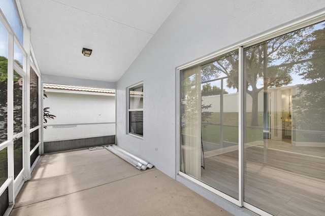 8182 Duomo Cir, Boynton Beach, FL 33472 - unfurnished sunroom with lofted ceiling and plenty of natural light