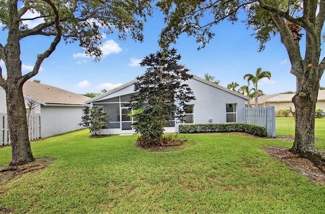 8182 Duomo Cir, Boynton Beach, FL 33472 - rear view of house with stucco siding and a sunroom