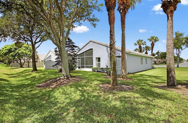 8182 Duomo Cir, Boynton Beach, FL 33472 - view of grassy yard featuring a sunroom